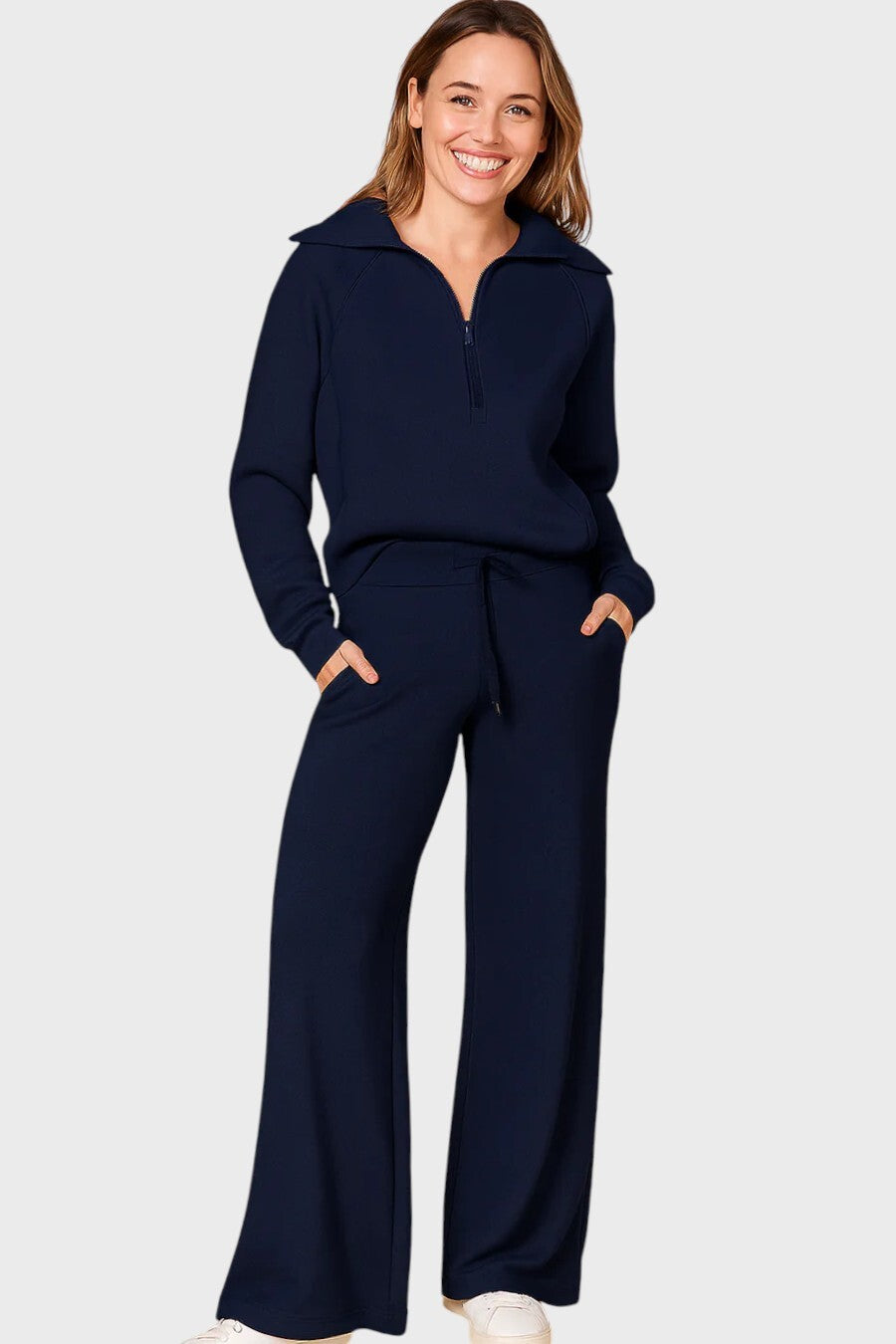 Damset med halvziptröja och byxor