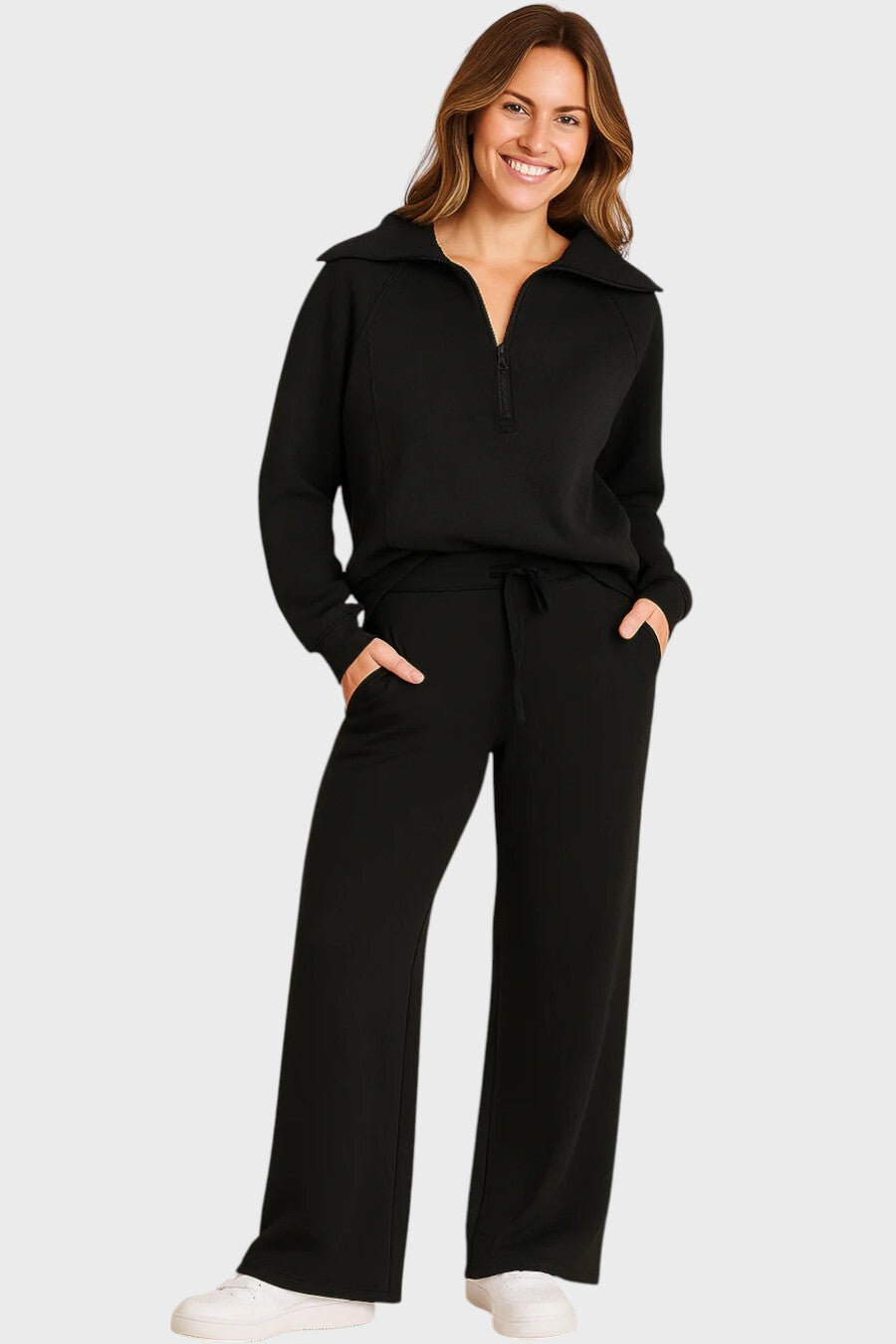 Damset med halvziptröja och byxor