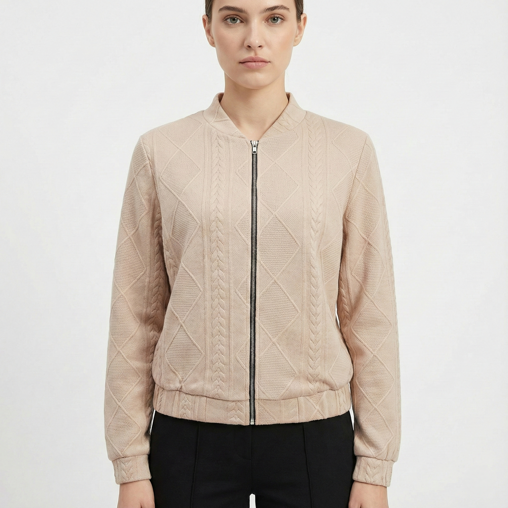 Damjacka med stickat mönster och dragkedja