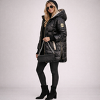 Lång quiltad jacka med huva för dam