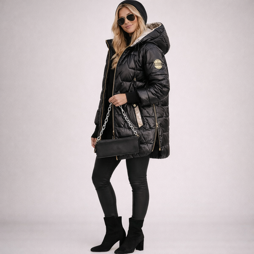 Lång quiltad jacka med huva för dam