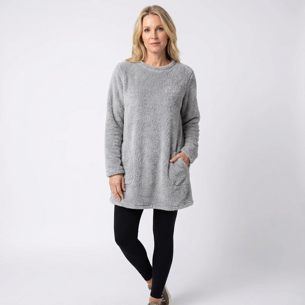Mjuk midjelång damtröja i avslappnad passform