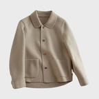 Damkavaj med knappar och rundad krage