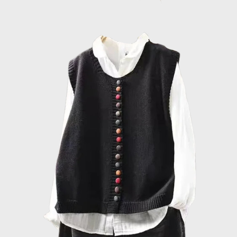 Stickad damväst med dekorativa färgade knappar