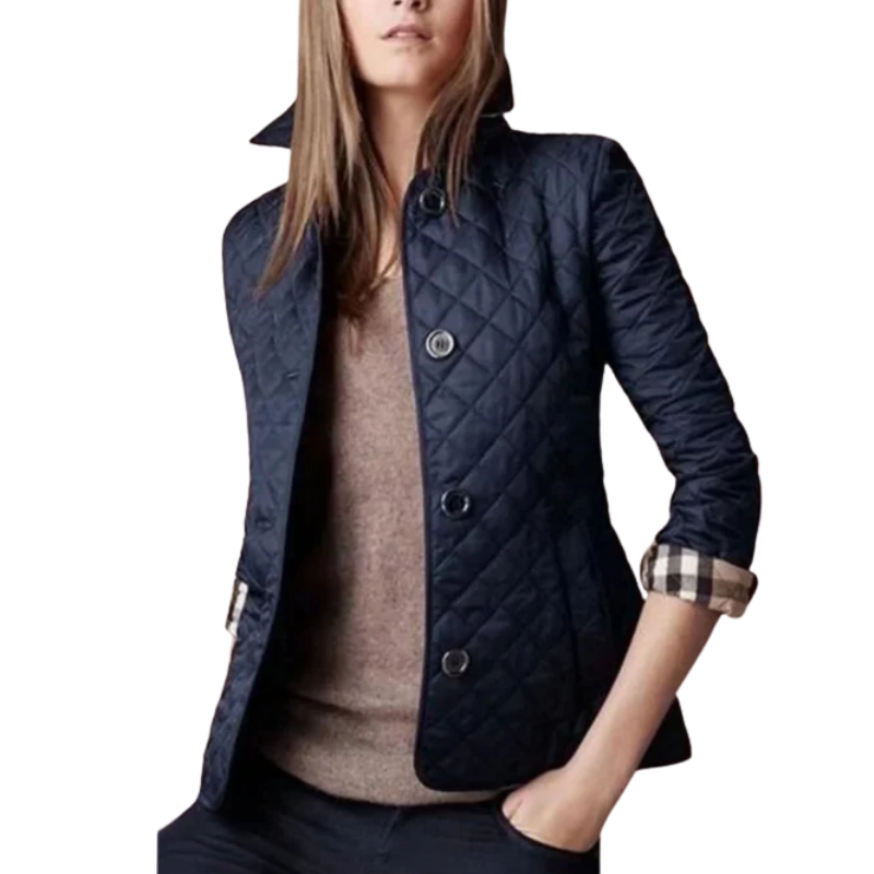 Damjacka med quiltat mönster och knappar