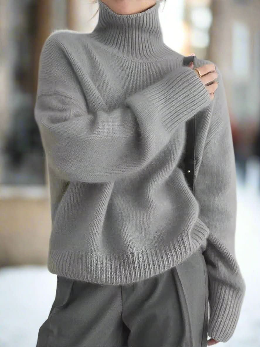 Stickad damtröja med hög polokrage