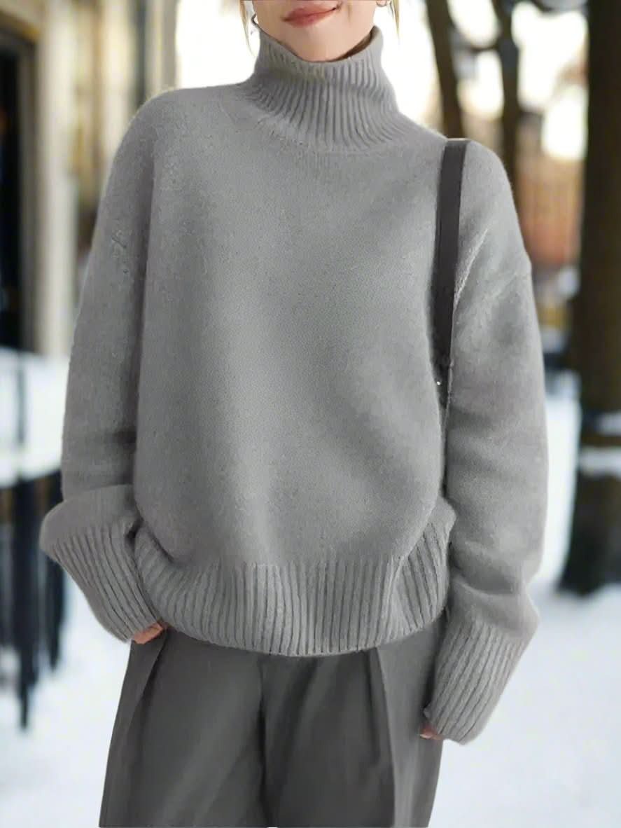 Stickad damtröja med hög polokrage