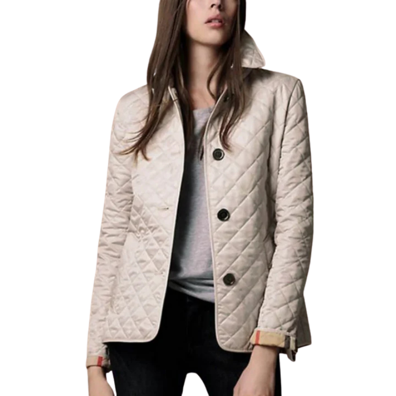 Damjacka med quiltat mönster och knappar