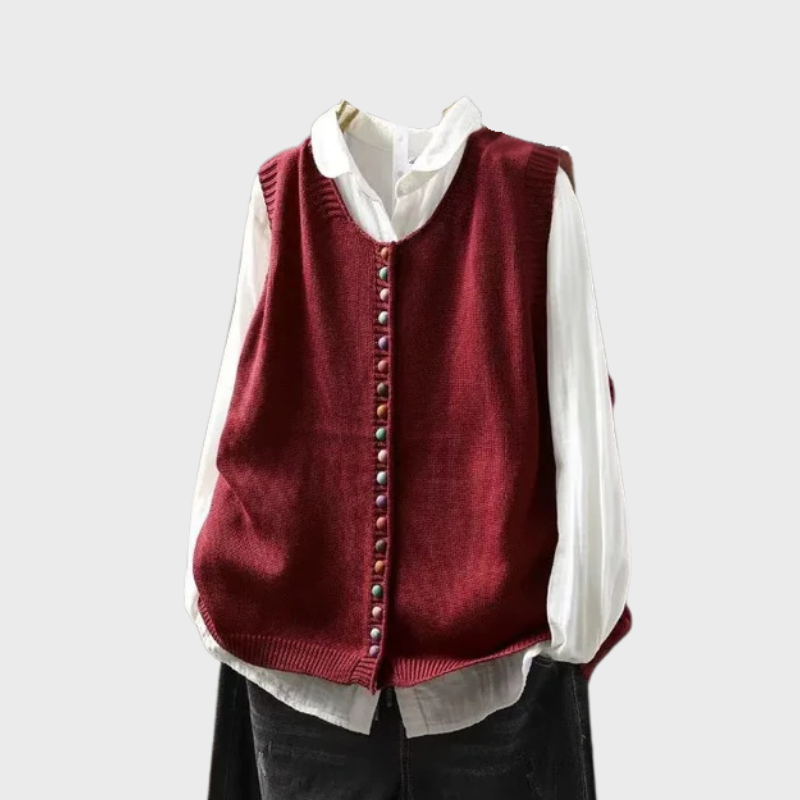 Stickad damväst med dekorativa färgade knappar