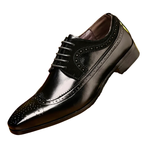 Herrskor med snörning och broguemönster