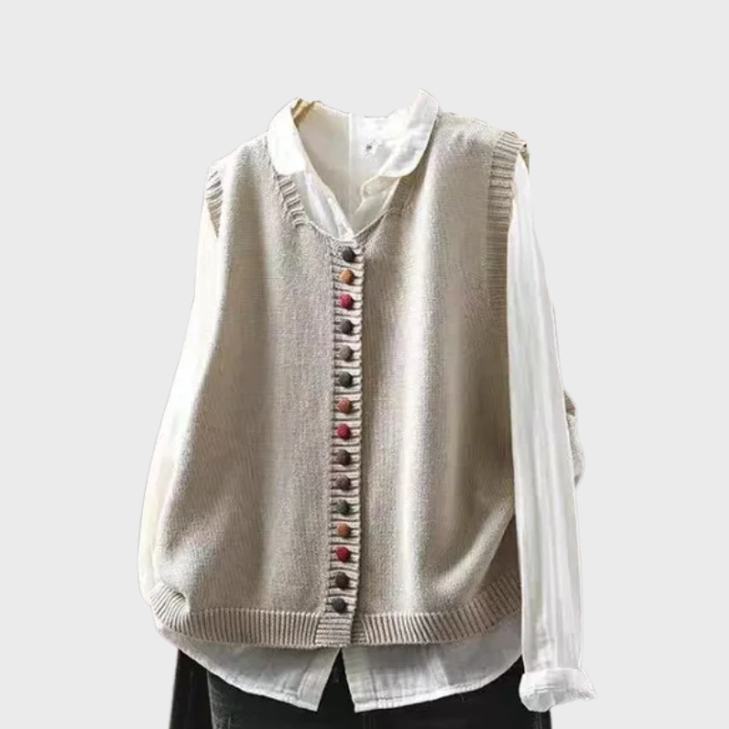 Stickad damväst med dekorativa färgade knappar