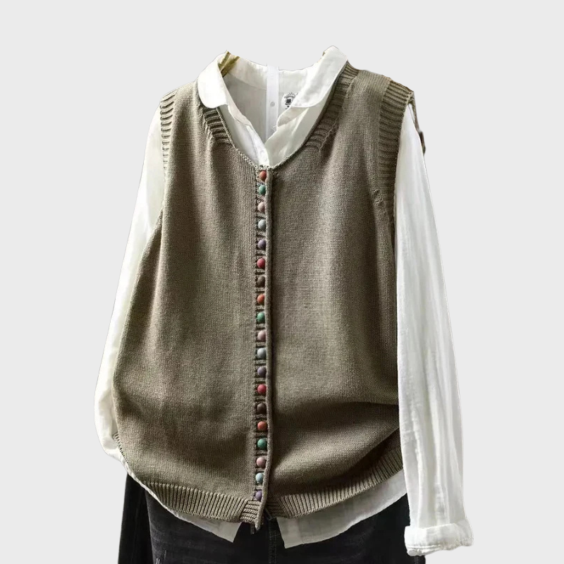 Stickad damväst med dekorativa färgade knappar