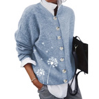 Stickad damkofta med maskrosmönster och knappar